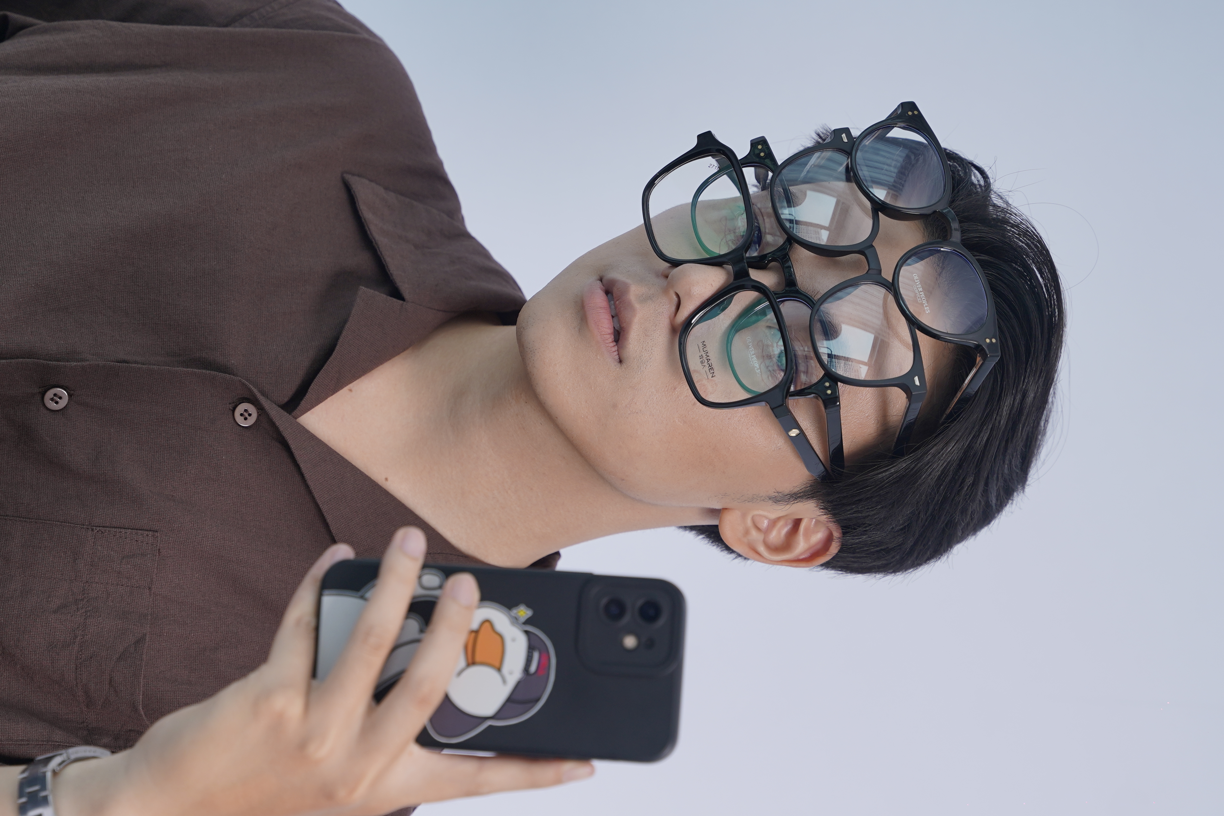 Model wearing Maroon glasses